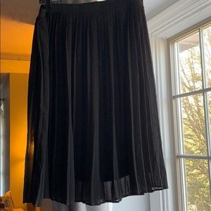 Black pleated midi skirt